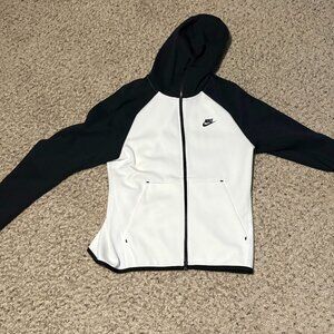Im selling a black and white Medium nike tech hoodie